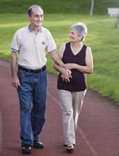 elderly couple walking