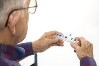 man taking pills